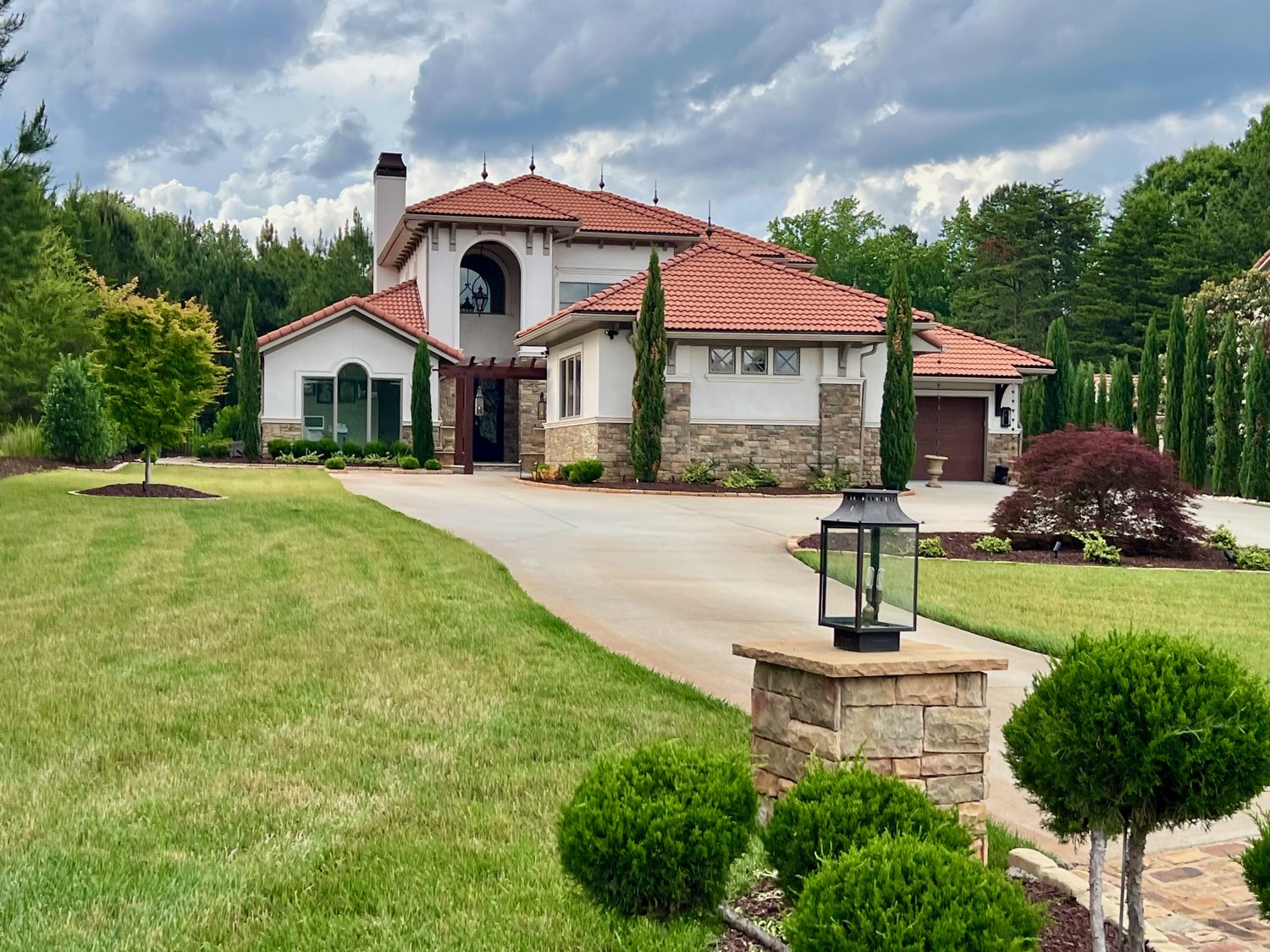 Tuscan-style Vineyard home with terracotta tile roof
