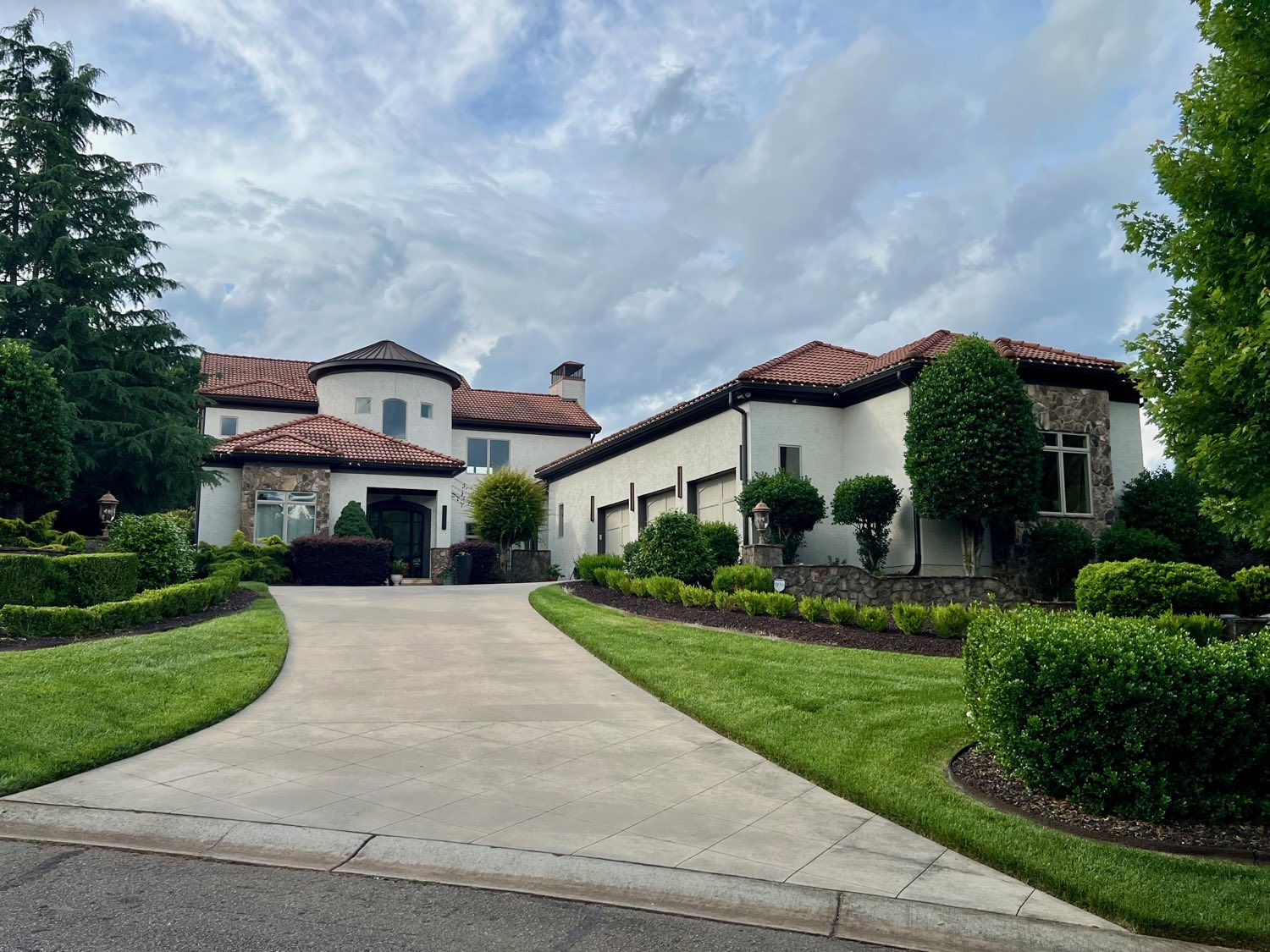 Spanish-Tuscan Vineyard estate with stucco and stone